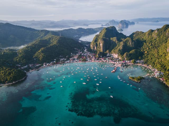 img4-https://unsplash.com/photos/landscape-photography-of-island-with-boats-3T9dDY0WqDI